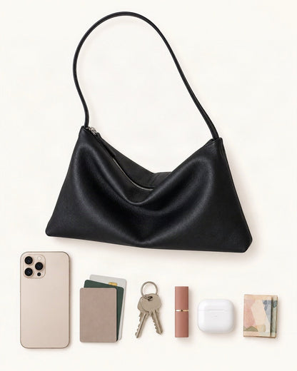 What fits in the Top-Grain Cowhide Hobo Shoulder Bag: a 6.9-inch phone (iPhone 16 Pro Max), cards, keys, a lipstick, AirPods in their case, folded notes