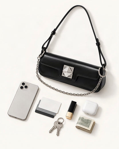 What fits in the Leather Baguette Shoulder Bag: a 6.9-inch phone (iPhone 16 Pro Max), cards, keys, a lipstick, AirPods in their case, folded notes