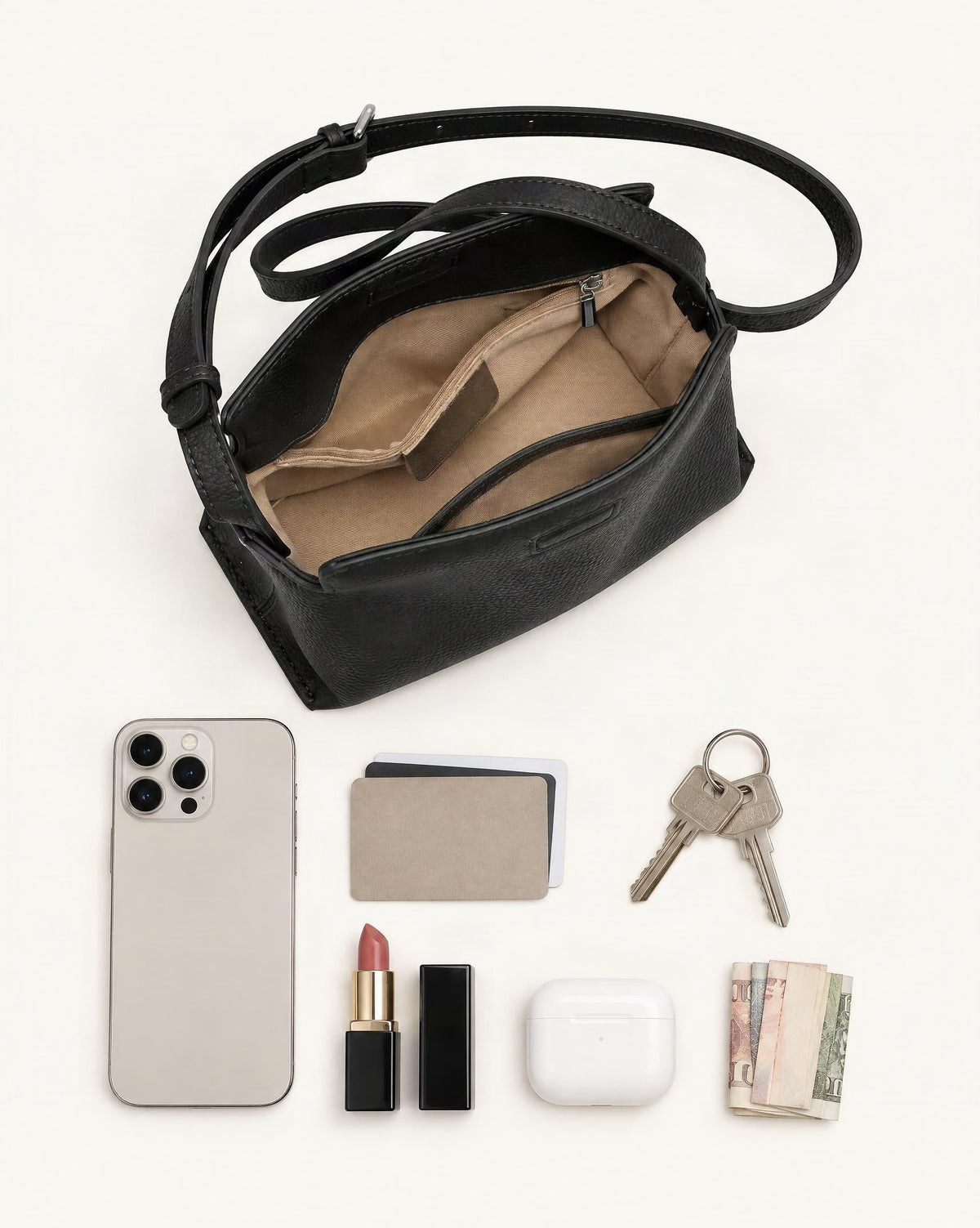 What fits in the Cowhide Leather Mini Crossbody Bag – Color Options: smartphone up to 6.9 in, cards, keys, a lipstick, airpods in their case, a few banknotes folded over into a small stack, no complete flat bill face showing