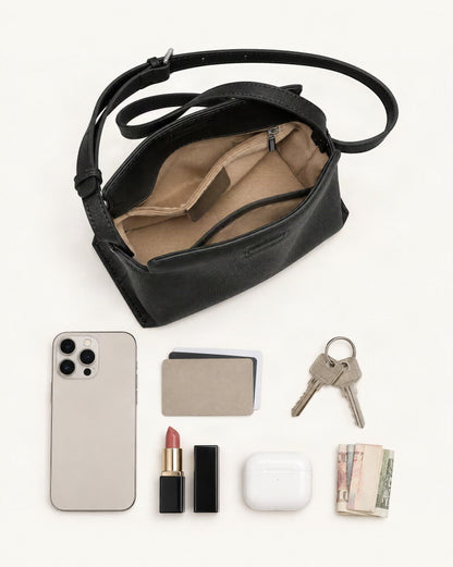 What fits in the Cowhide Leather Mini Crossbody Bag – Color Options: smartphone up to 6.9 in, cards, keys, a lipstick, airpods in their case, a few banknotes folded over into a small stack, no complete flat bill face showing