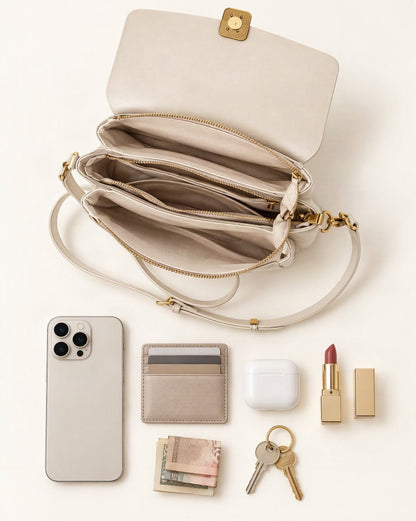 What fits in the Cowhide Leather Small Crossbody Bag with Adjustable Strap: smartphone up to 6.9 in, cards, keys, a lipstick, airpods in their case, a few banknotes folded over into a small stack, no complete flat bill face showing