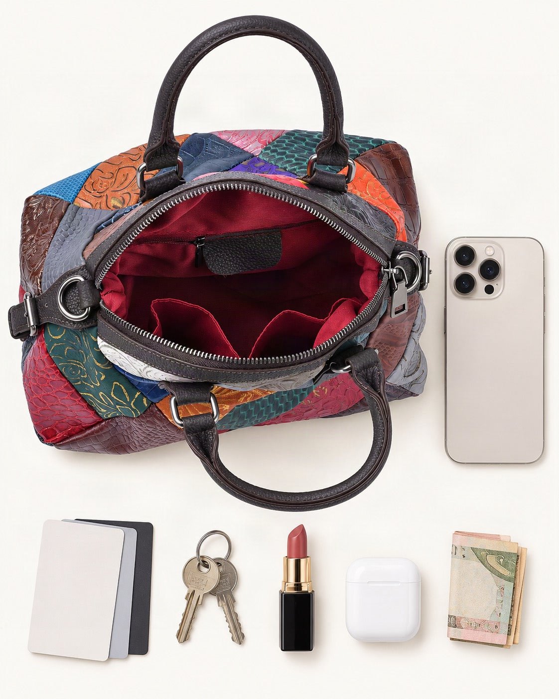 What fits in the Top-Grain Cowhide Patchwork Shoulder Bag: smartphone up to 6.9 in, cards, keys, a lipstick, airpods in their case, a few banknotes folded over into a small stack, no complete flat bill face showing