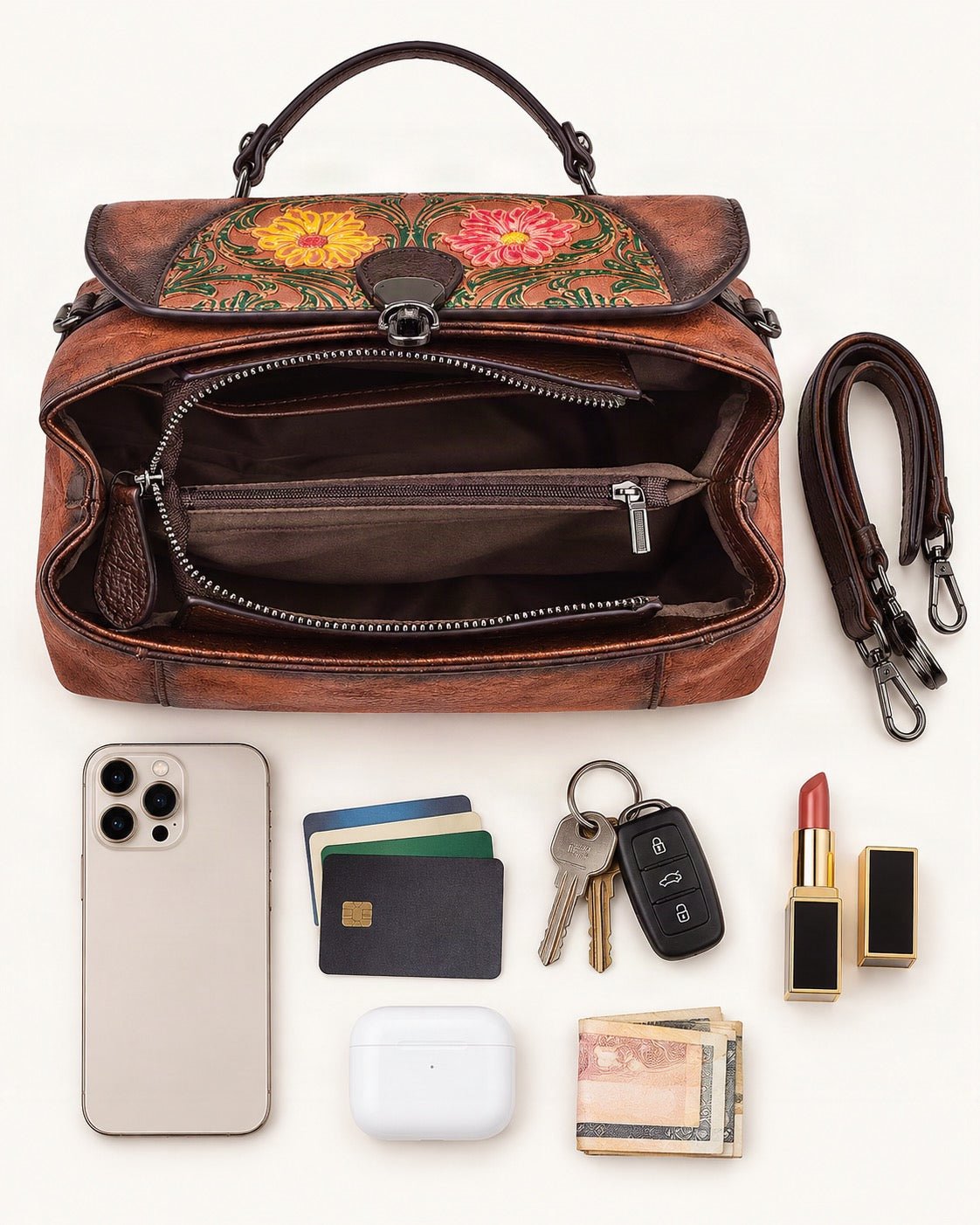 What fits in the Top-Grain Cowhide Top-Handle Crossbody Bag: smartphone up to 6.9 in, cards, keys, a lipstick, airpods in their case, a few banknotes folded over into a small stack, no complete flat bill face showing