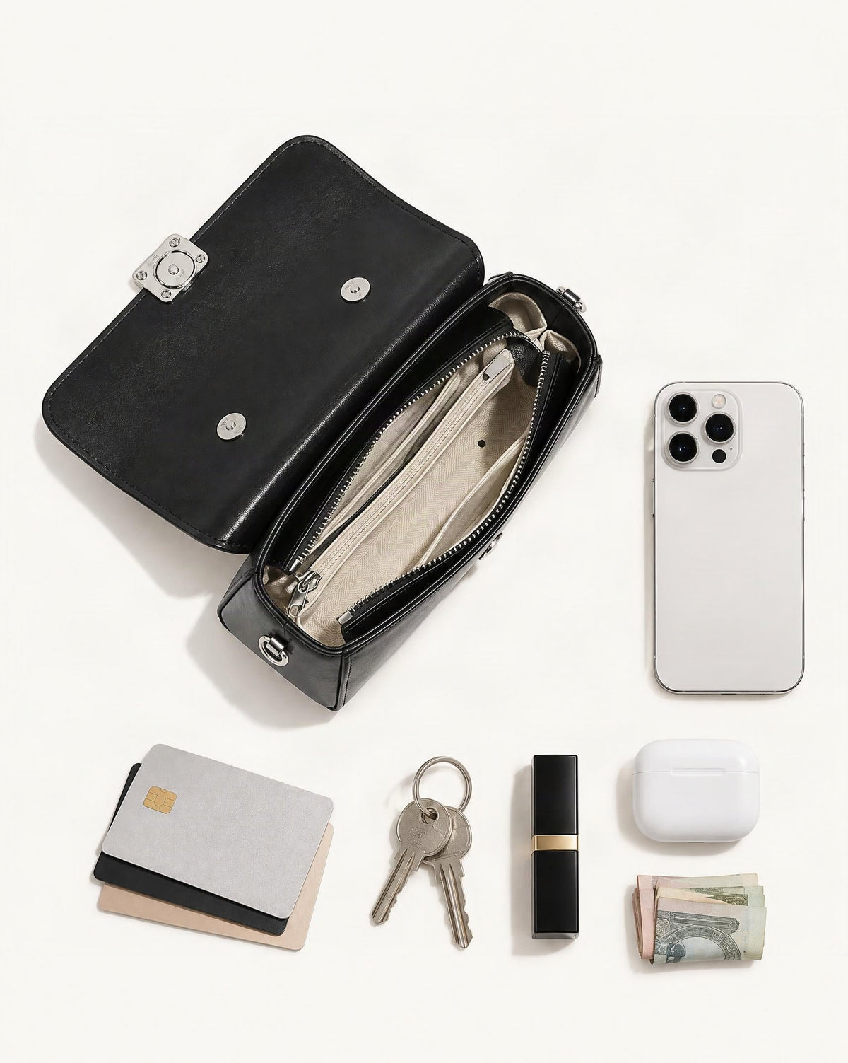 What fits in the Cowhide Leather Small Top-Handle Crossbody Bag: smartphone up to 6.9 in, cards, keys, a lipstick, airpods in their case, a few banknotes folded over into a small stack, no complete flat bill face showing