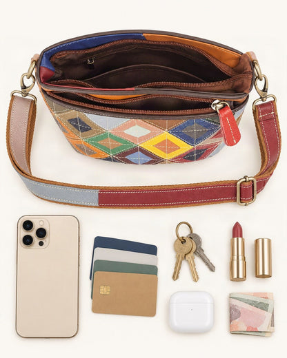 What fits in the Top-Grain Cowhide Small Crossbody Bag: smartphone up to 6.9 in, cards, keys, a lipstick, airpods in their case, a few banknotes folded over into a small stack, no complete flat bill face showing