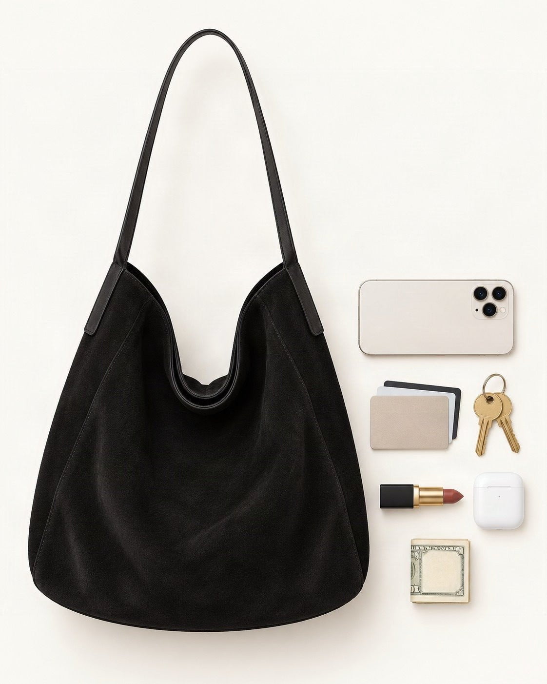 What fits in the Suede Cowhide Shoulder Tote Bag: a 6.9-inch phone (iPhone 16 Pro Max), cards, keys, a lipstick, AirPods in their case, folded notes