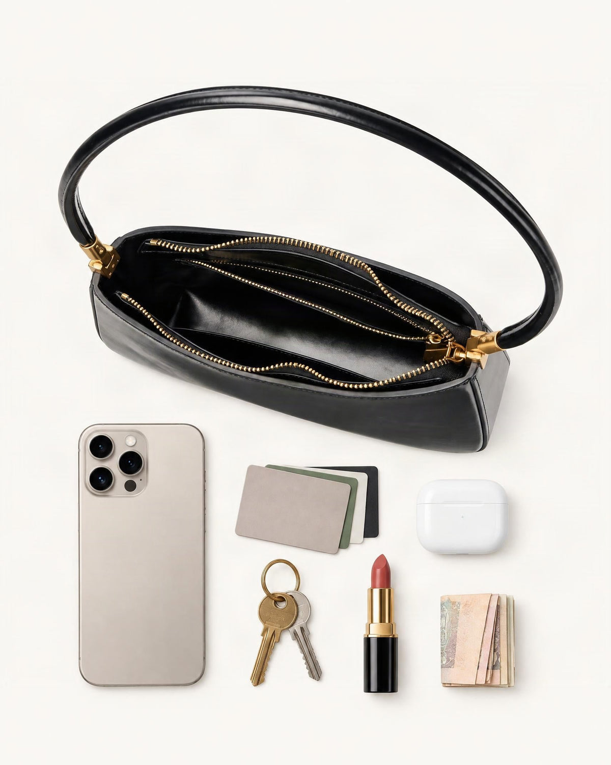What fits in the Cowhide Leather Shoulder Bag: smartphone up to 6.9 in, cards, keys, a lipstick, airpods in their case, a few banknotes folded over into a small stack, no complete flat bill face showing