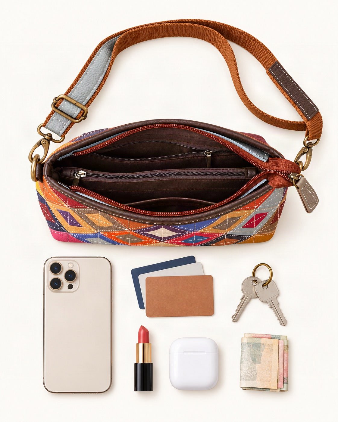 What fits in the Top-Grain Cowhide Patchwork Shoulder Crossbody Bag: smartphone up to 6.9 in, cards, keys, a lipstick, airpods in their case, a few banknotes folded over into a small stack, no complete flat bill face showing