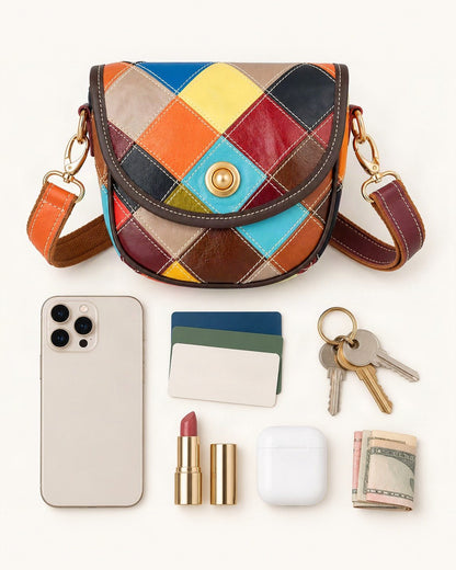 What fits in the Cowhide Patchwork Crossbody Bag: smartphone up to 6.9 in, cards, keys, a lipstick, airpods in their case, a few banknotes folded over into a small stack, no complete flat bill face showing