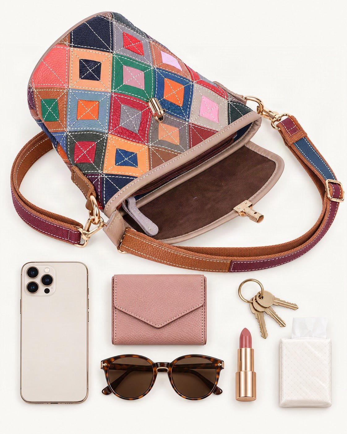 What fits in the Top-Grain Cowhide Patchwork Bucket Crossbody Bag: a smartphone, a small wallet, keys, sunglasses, a lipstick and tissues 
