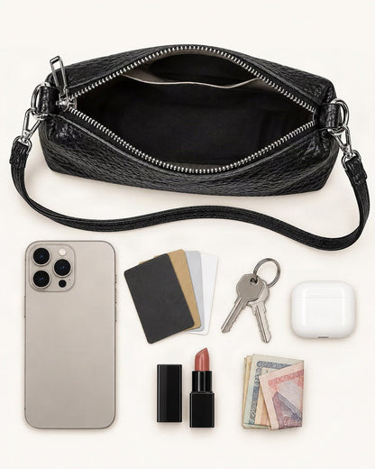 What fits in the Top-Grain Cowhide Small Shoulder Crossbody Bag: smartphone up to 6.9 in, cards, keys, a lipstick, airpods in their case, a few banknotes folded over into a small stack, no complete flat bill face showing