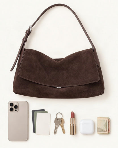 What fits in the Suede Leather Small Plus Shoulder Bag – Color Options: a 6.9-inch phone (iPhone 16 Pro Max), cards, keys, a lipstick, AirPods in their case, folded notes