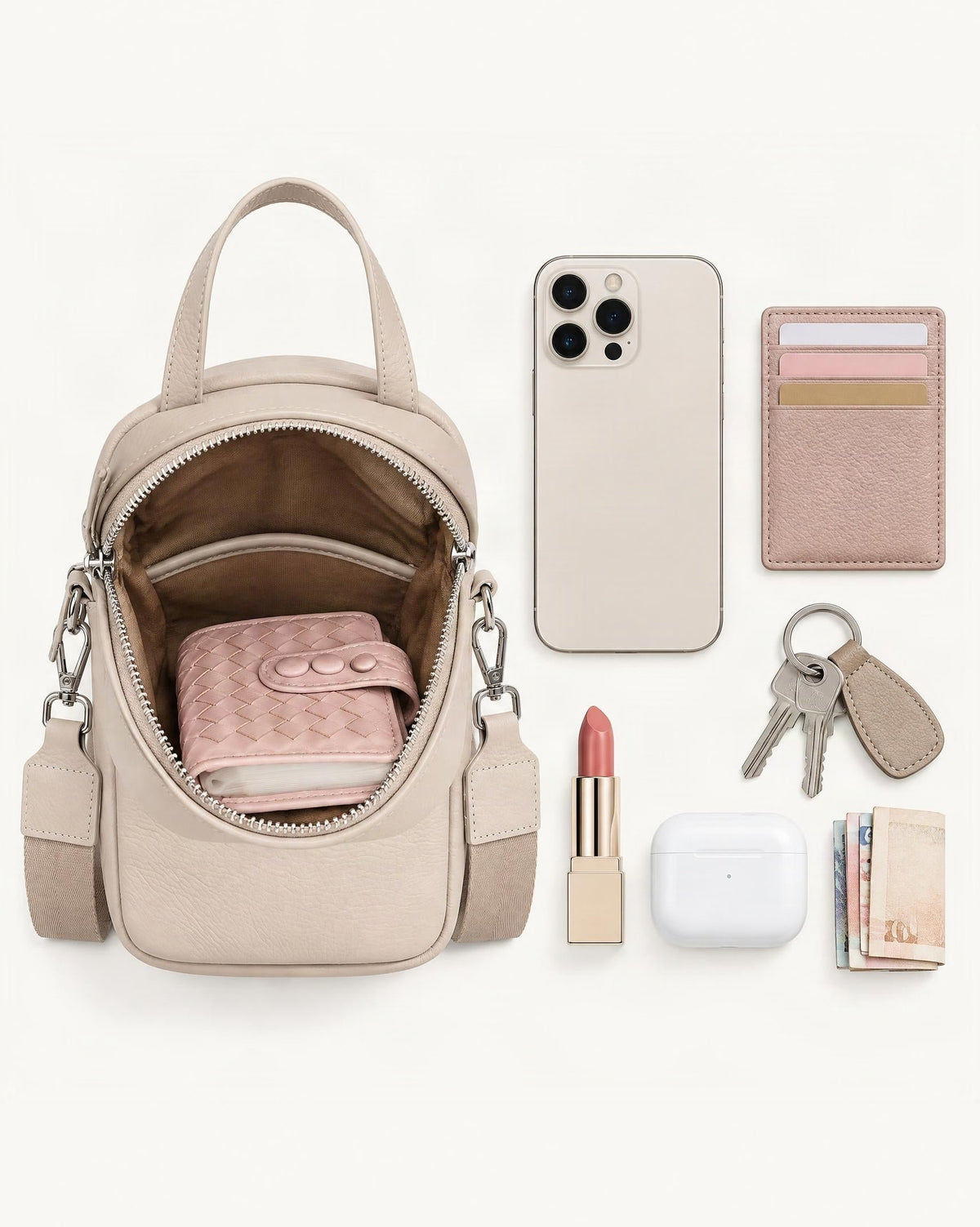 What fits in the Pebbled Cowhide Leather Mini Crossbody Phone Bag: smartphone up to 6.9 in, cards, keys, a lipstick, airpods in their case, a few banknotes folded over into a small stack, no complete flat bill face showing