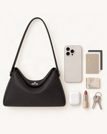 What fits in the Pebbled Cowhide Leather Underarm Crossbody Bag: smartphone up to 6.9 in, cards, keys, a lipstick, airpods in their case, a few banknotes folded over into a small stack, no complete flat bill face showing