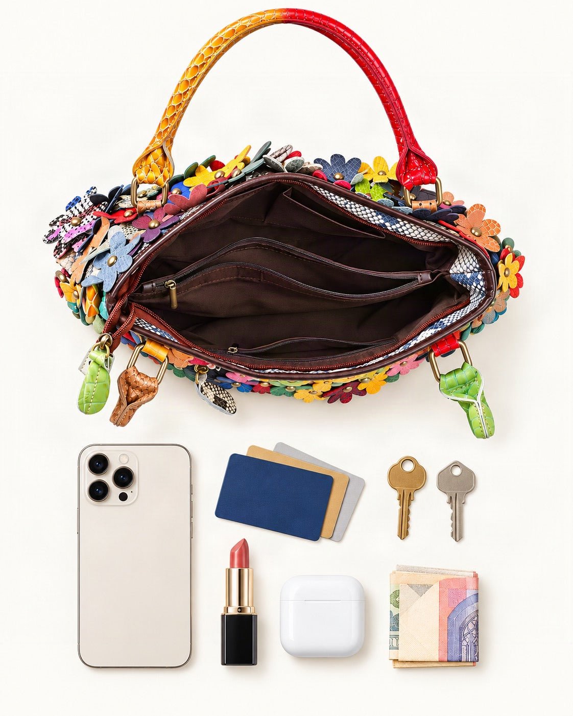 What fits in the Leather Small Plus Shoulder Bag – Multicolor: smartphone up to 6.9 in, cards, keys, a lipstick, airpods in their case, a few banknotes folded over into a small stack, no complete flat bill face showing
