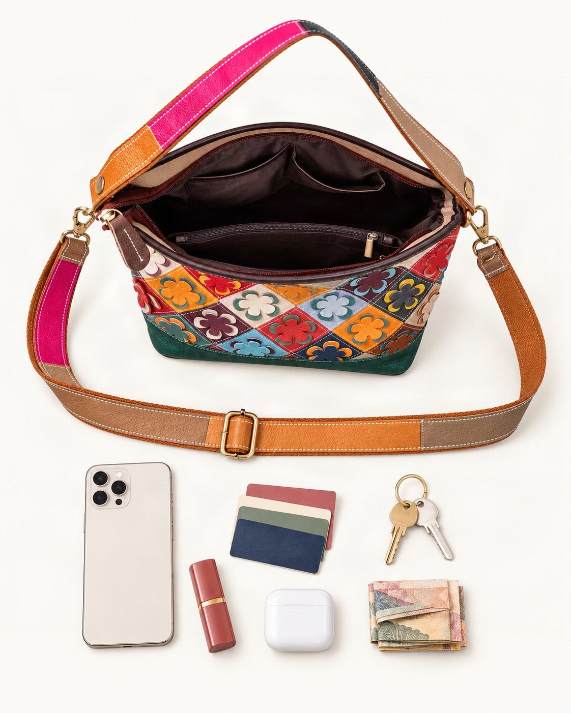 What fits in the Top-Grain Cowhide Small Crossbody Bag: smartphone up to 6.9 in, cards, keys, a lipstick, airpods in their case, a few banknotes folded over into a small stack, no complete flat bill face showing
