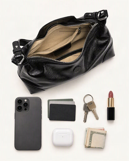 What fits in the Cowhide Leather Small Shoulder Bag with Adjustable Strap: smartphone up to 6.9 in, cards, keys, a lipstick, airpods in their case, a few banknotes folded over into a small stack, no complete flat bill face showing