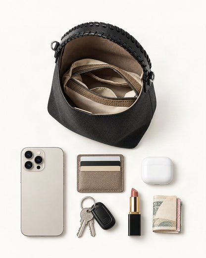 What fits in the Cowhide Leather Bucket Bag Braided Handle: smartphone up to 6.9 in, cards, keys, a lipstick, airpods in their case, a few banknotes folded over into a small stack, no complete flat bill face showing