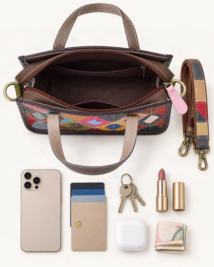 What fits in the Top-Grain Cowhide Small Shoulder Bag – Multicolor: smartphone up to 6.9 in, cards, keys, a lipstick, airpods in their case, a few banknotes folded over into a small stack, no complete flat bill face showing