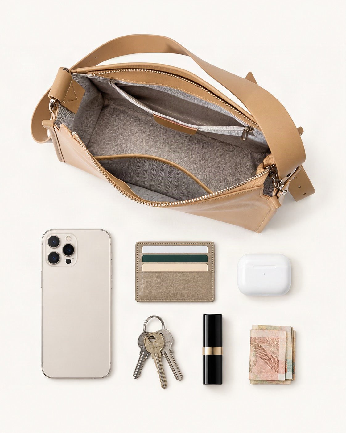 What fits in the Cowhide Leather Pillow Crossbody Bag: smartphone up to 6.9 in, cards, keys, a lipstick, airpods in their case, a few banknotes folded over into a small stack, no complete flat bill face showing