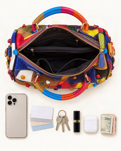 What fits in the Top-Grain Cowhide Small Plus Boston Bag: smartphone up to 6.9 in, cards, keys, a lipstick, airpods in their case, a few banknotes folded over into a small stack, no complete flat bill face showing