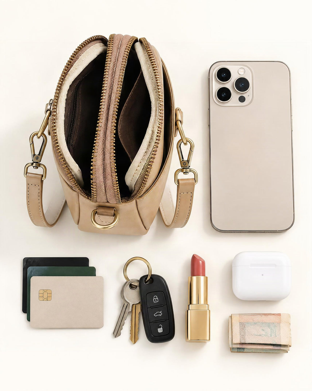 What fits in the Cowhide Leather Micro Crossbody Bag with Adjustable Strap: smartphone up to 6.9 in, cards, keys, a lipstick, airpods in their case, a few banknotes folded over into a small stack, no complete flat bill face showing