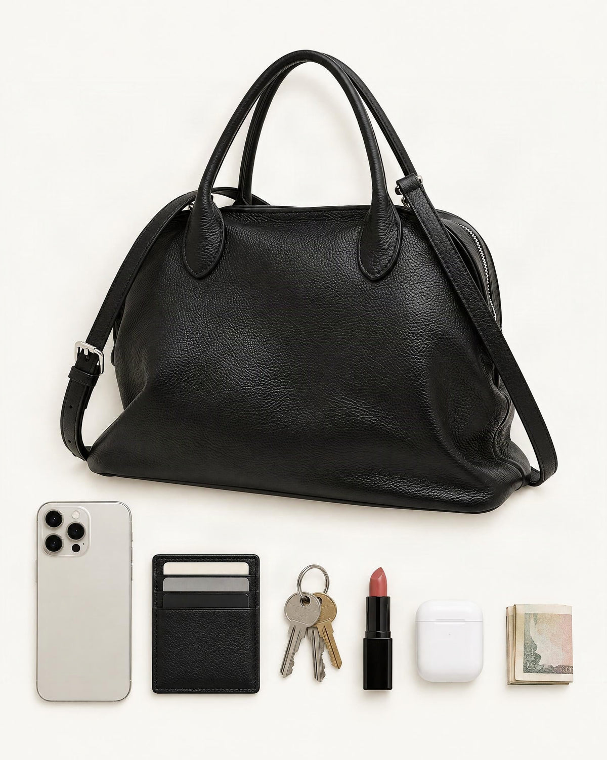 What fits in the Cowhide Leather Small Bowling Tote Bag, Pebbled: smartphone up to 6.9 in, cards, keys, a lipstick, airpods in their case, a few banknotes folded over into a small stack, no complete flat bill face showing