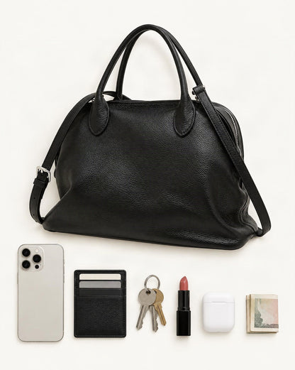 What fits in the Cowhide Leather Small Bowling Tote Bag, Pebbled: smartphone up to 6.9 in, cards, keys, a lipstick, airpods in their case, a few banknotes folded over into a small stack, no complete flat bill face showing