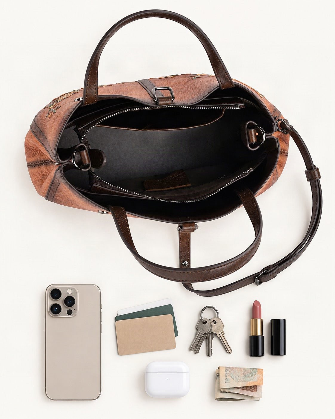 What fits in the Cowhide Small Tote Bag: smartphone up to 6.9 in, cards, keys, a lipstick, airpods in their case, a few banknotes folded over into a small stack, no complete flat bill face showing