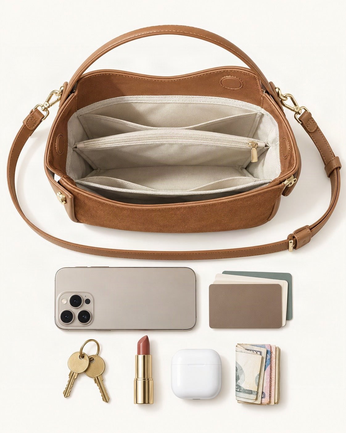 What fits in the Suede Cowhide Small Plus Shoulder Bag: a 6.9-inch phone (iPhone 16 Pro Max), cards, keys, a lipstick, AirPods in their case, folded notes